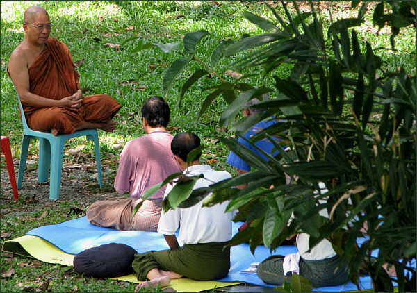 Meditation teacher during interview with yogis at retreat, Singapore April 2009