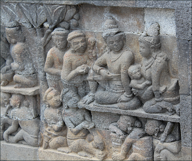 Distraction and burden of a householder life, scene from Borobudur